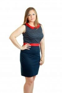 Chubby young woman in a dress.