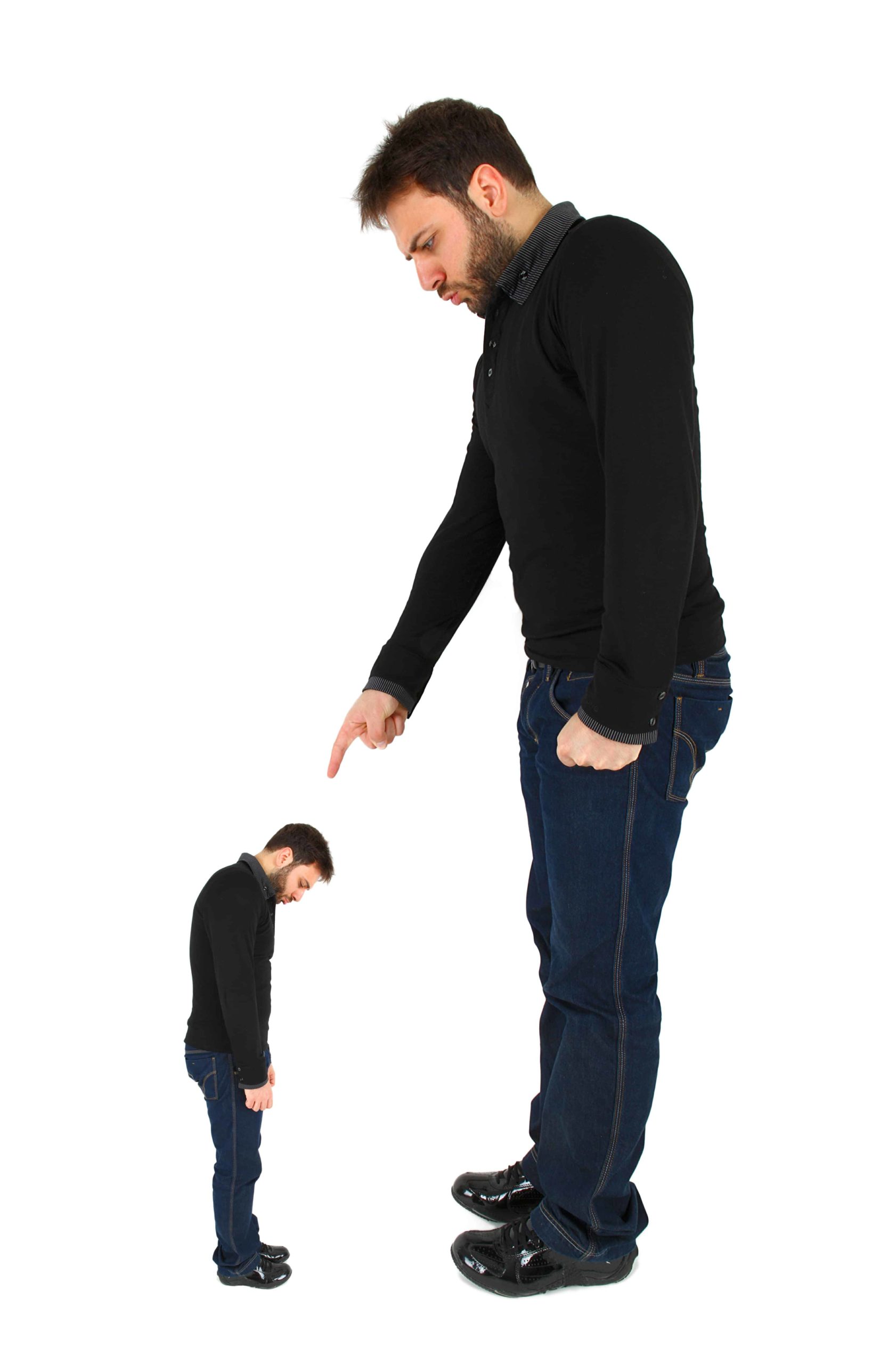 Large man pointing a finger at a smaller version of himself. The little guy is looking down, ashamed.