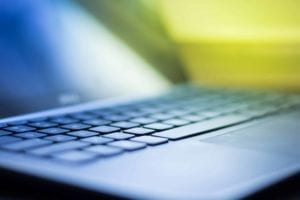 Close up of a laptop keyboard and screen