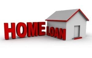 Toy white house with 3d words HOME LOAN in red.