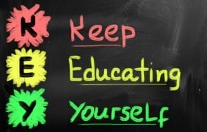 Chalkboard with the word "Key" = Keep Educating Yourself