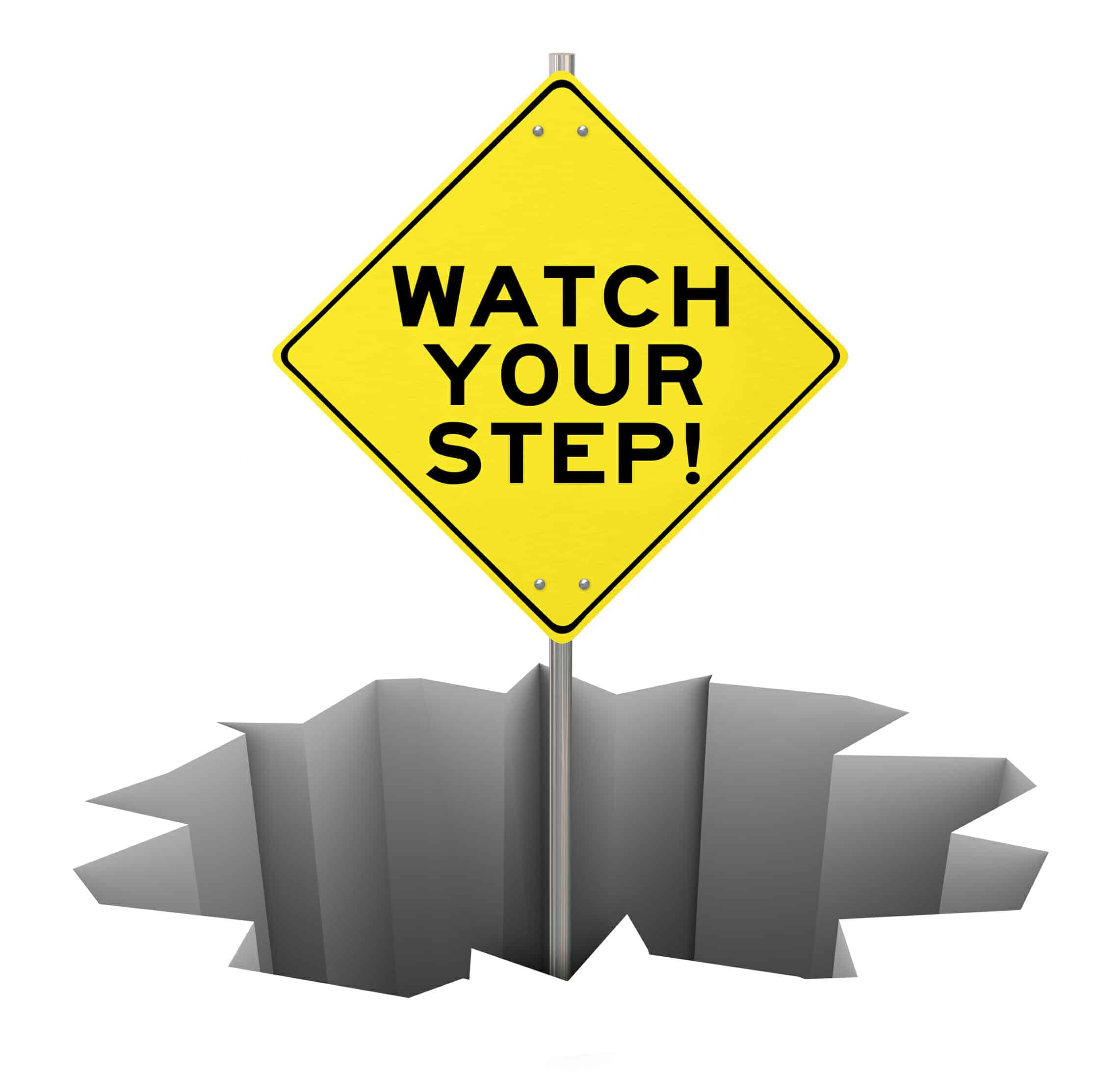 Yellow "Watch Your Step" sign coming out of an open crater.
