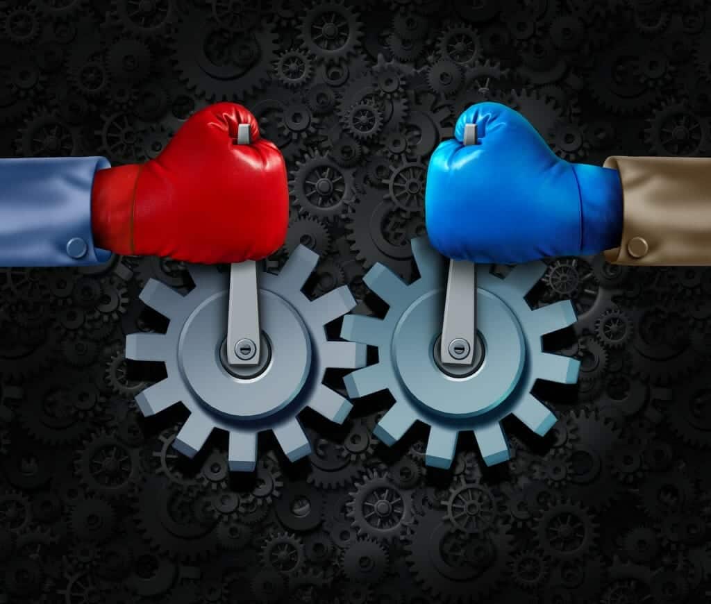 Red and blue boxing gloves holding gears steady - make peace