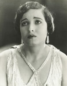 Vintage photo of woman in the 20's filled with self-pity. Eternal victim of divorce.