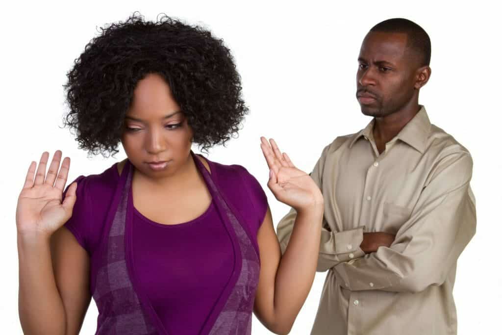 Divorcing African American couple arguing with each other