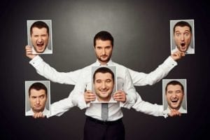 Man with 4 extra arms holding pictures of himself with different emotions on his face. Mixed emotions.