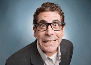 Stressed man with eyes bulging trying to survive his divorce hearing