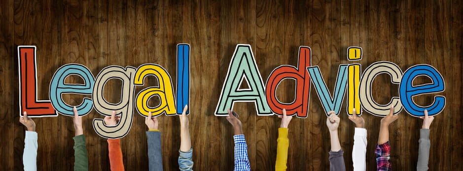 Hands holding up letters spelling "Legal Advice"
