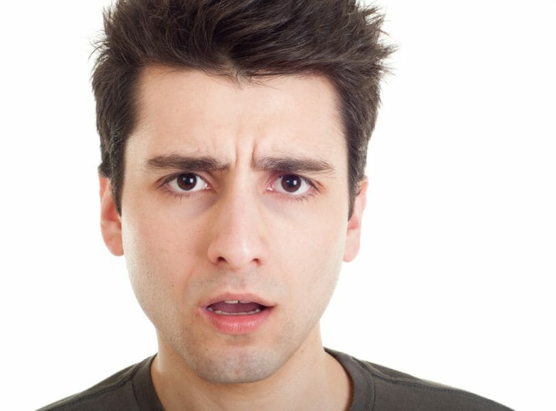 Confused face of a man facing a contested divorce