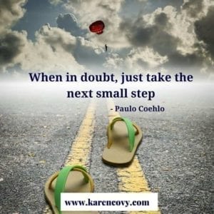 Empty sandals on a road with the saying, "When in doubt, just take the next small step."