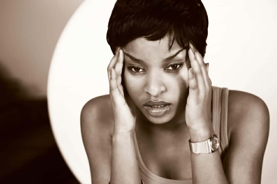 Upset African American woman contemplating divorce