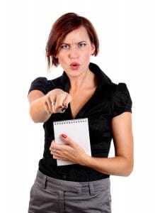 Upset woman pointing a finger, blaming her ex