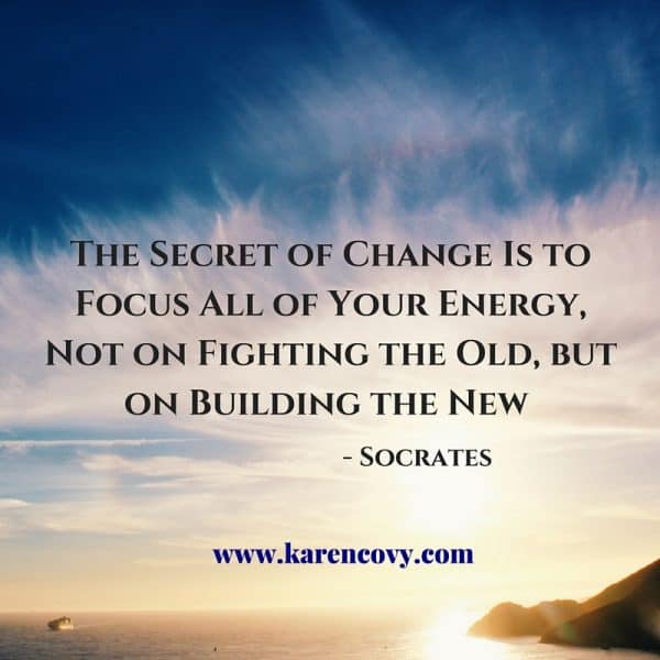 Spectacular sunrise over the water with quote: The Secret of Change is to Focus All of Your Energy Not on Fighting the Old, but on Building the New.