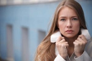 Closeup of upset beautiful woman whose husband is cheating
