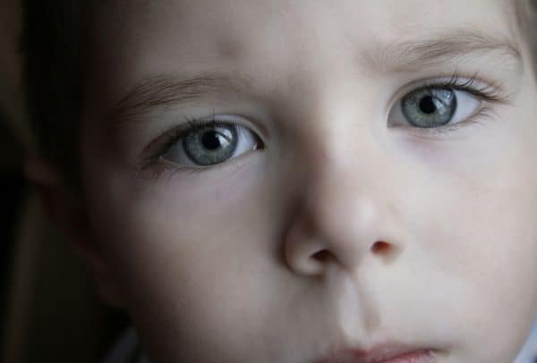 Close up of sad boy symbolizing Divorce and Children in Illnois