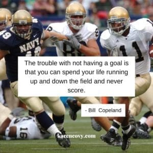Notre Dame and Navy football game with a quote: The trouble with not having a goal is that you can spend your life running up and down the field and never score.