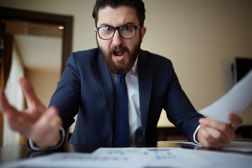 Screaming divorce lawyer at his desk