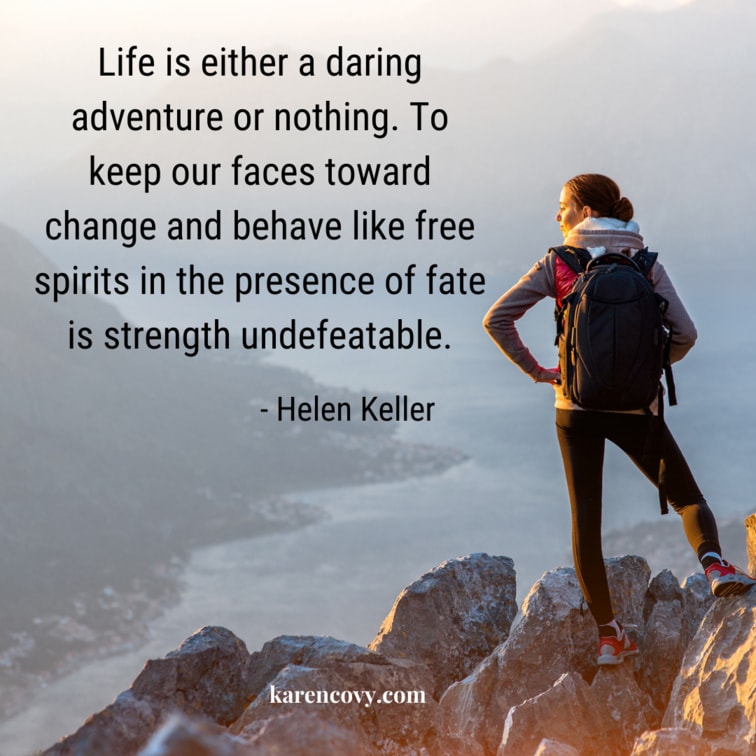 Woman standing on top of a mountain. Helen Keller quote: "Life is either a daring adventure or nothing."