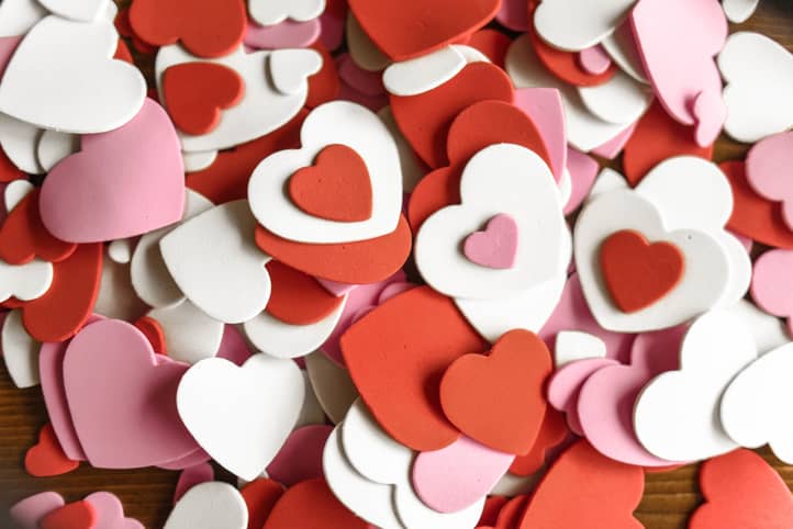 Red, white and pink hearts of different shapes signifying celebrating Valentine's Day