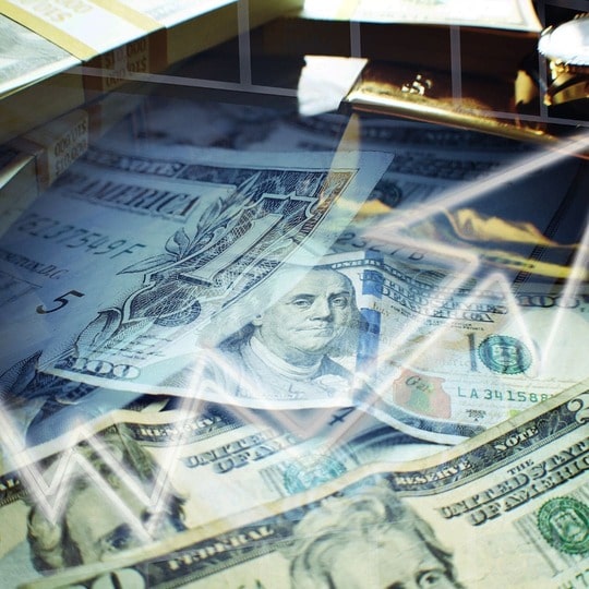 Pile of money with an upward trend line superimposed over the top.