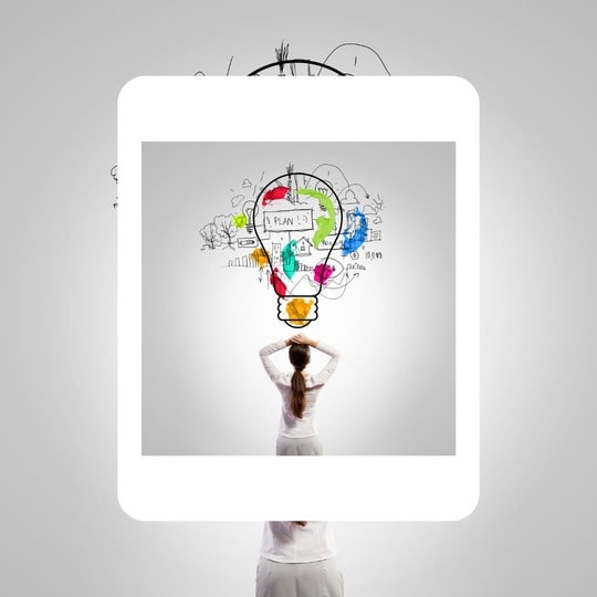 Woman with a swirling lightbulb over her head. Planning.