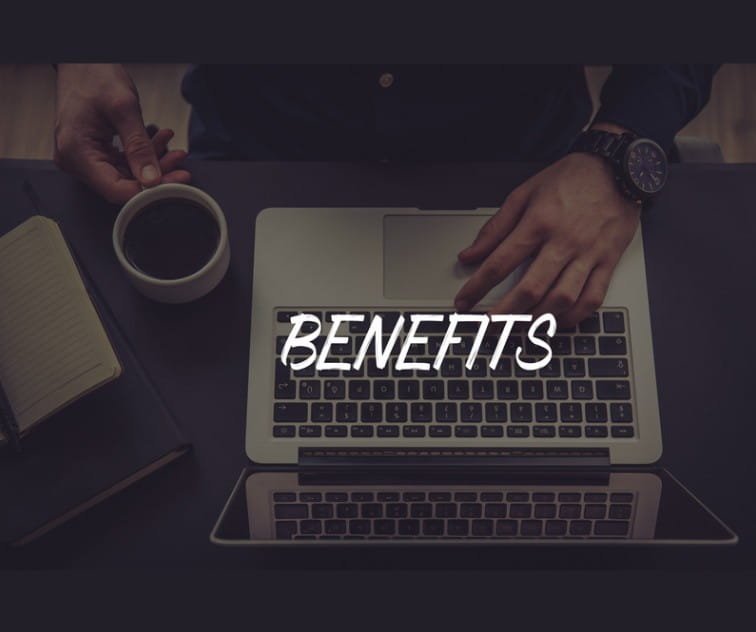 Hands on a laptop with the word "Benefits" over them.