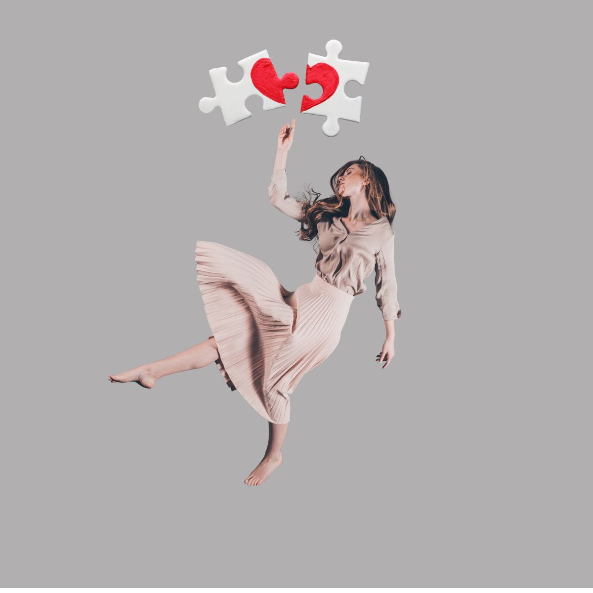 Woman with broken heart puzzle pieces above her head free-falling down.